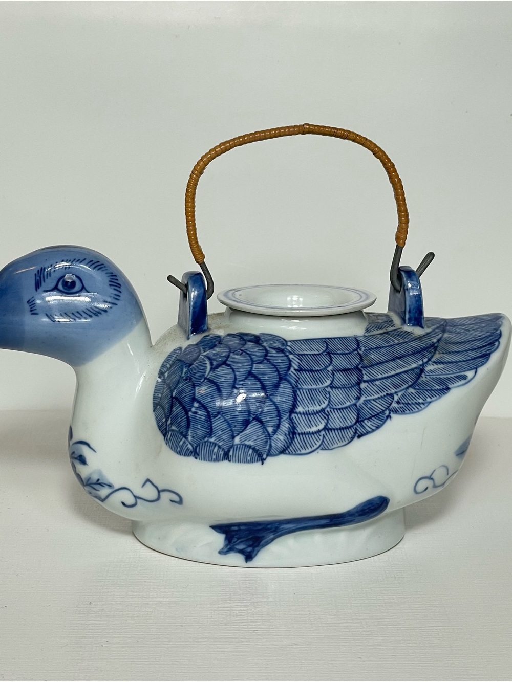 Vintage Blue and White Chinoiserie Ceramic Duck Teapot With Rattan Handle
